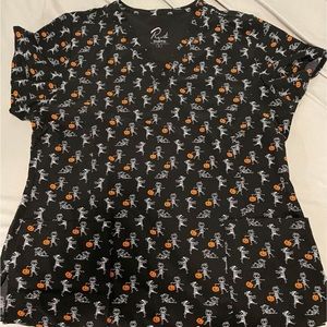 6 scrub tops and 1 bottom.